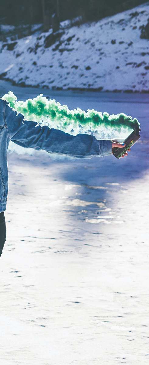 tibble fork reservoir person holding green smoke can united states